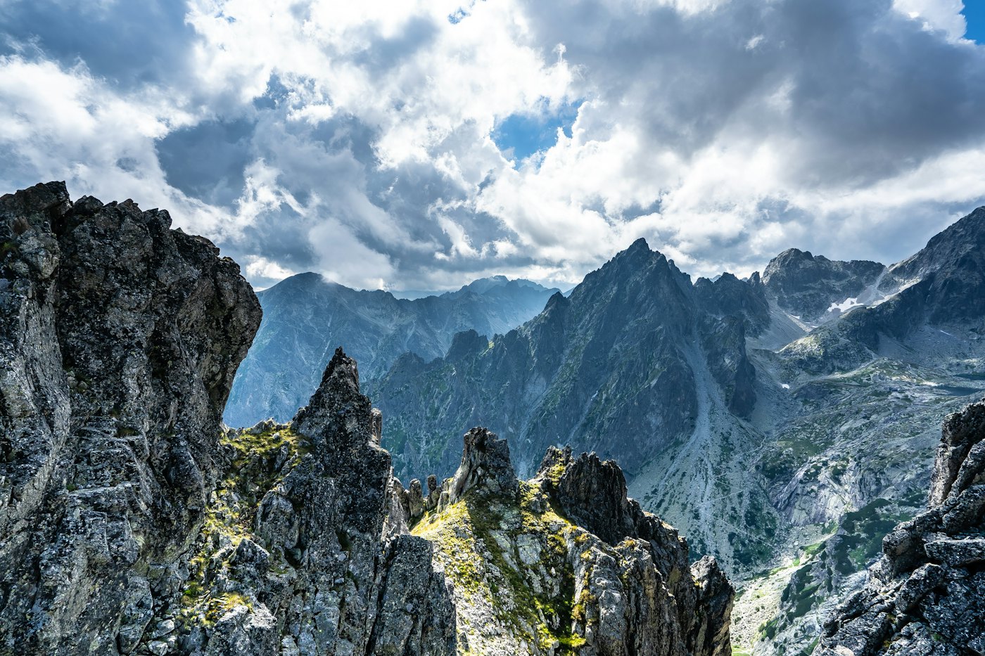 Rocky Tatra peak under white clouds from the guesthouse sample