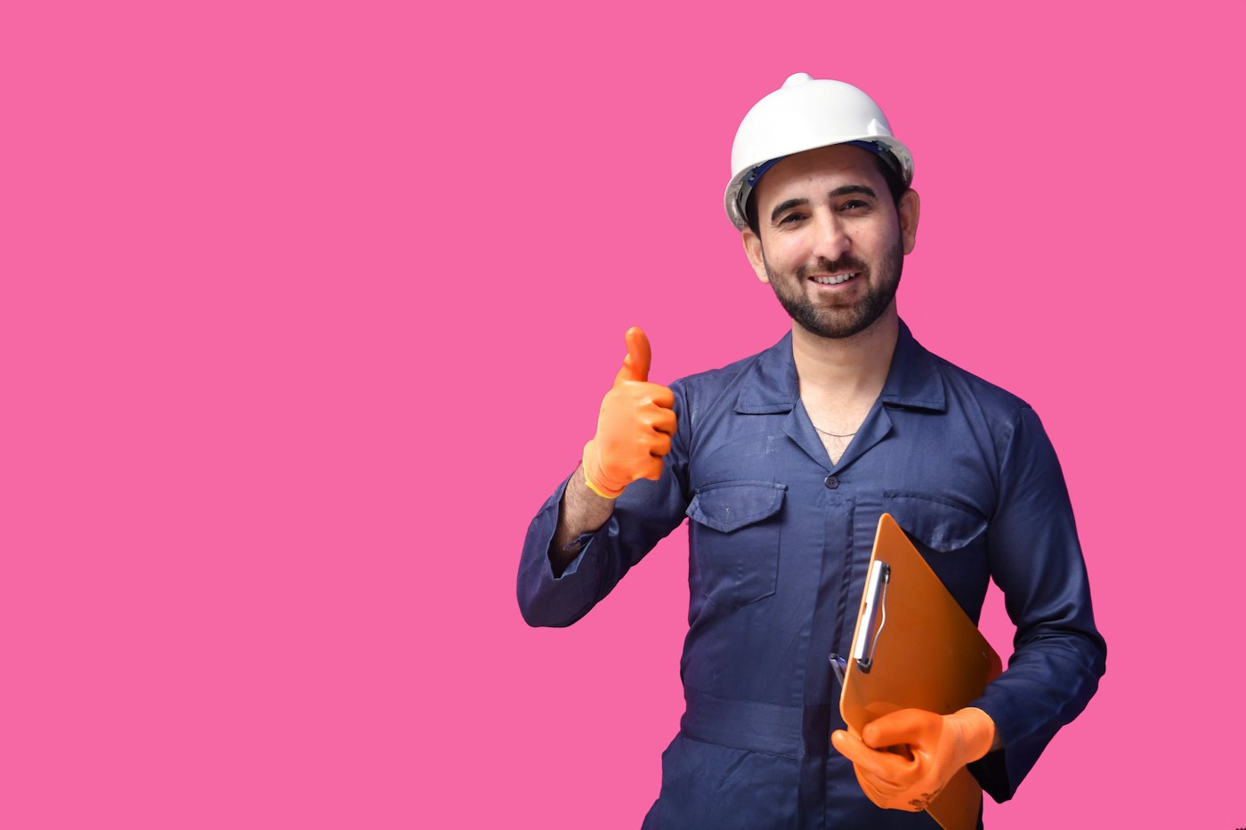 a person wearing a hard hat and holding a yellow object